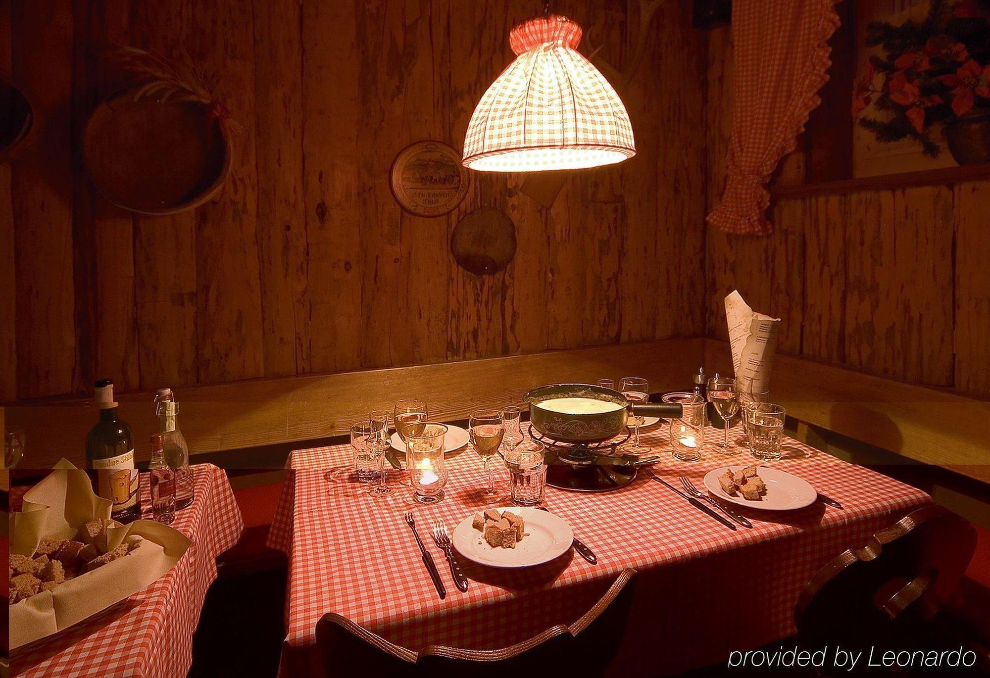 Posthotel Holiday Villa Arosa Restaurante foto