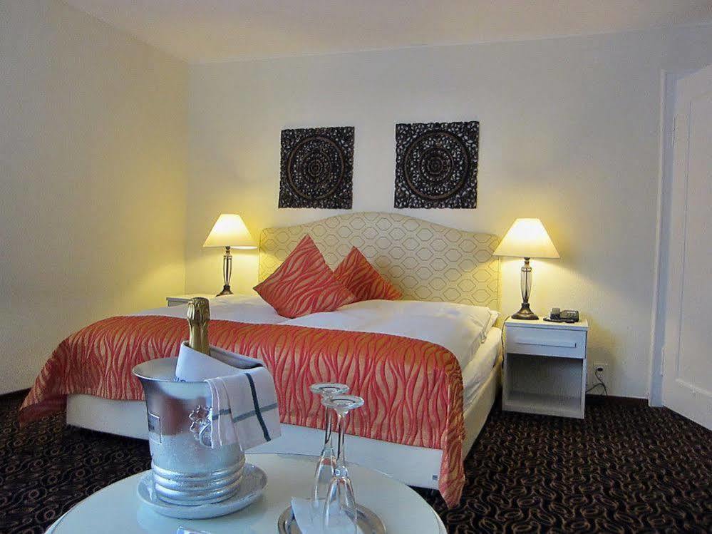 Posthotel Holiday Villa Arosa Quarto foto